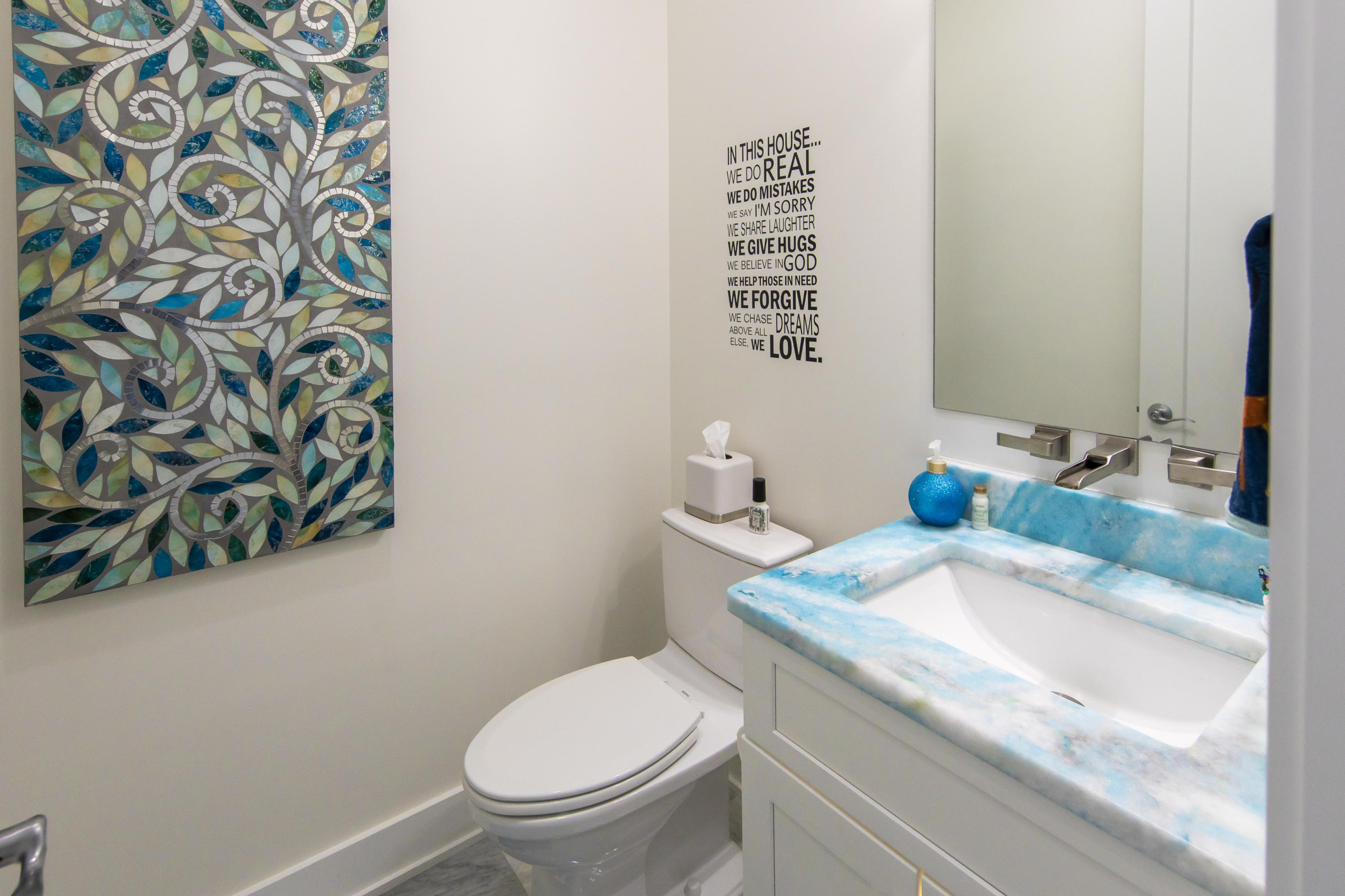 21222 Front Beach Road Panama City Beach, FL 32413 - Photo 34 of 60 a bathroom with a granite countertop toilet and a sink