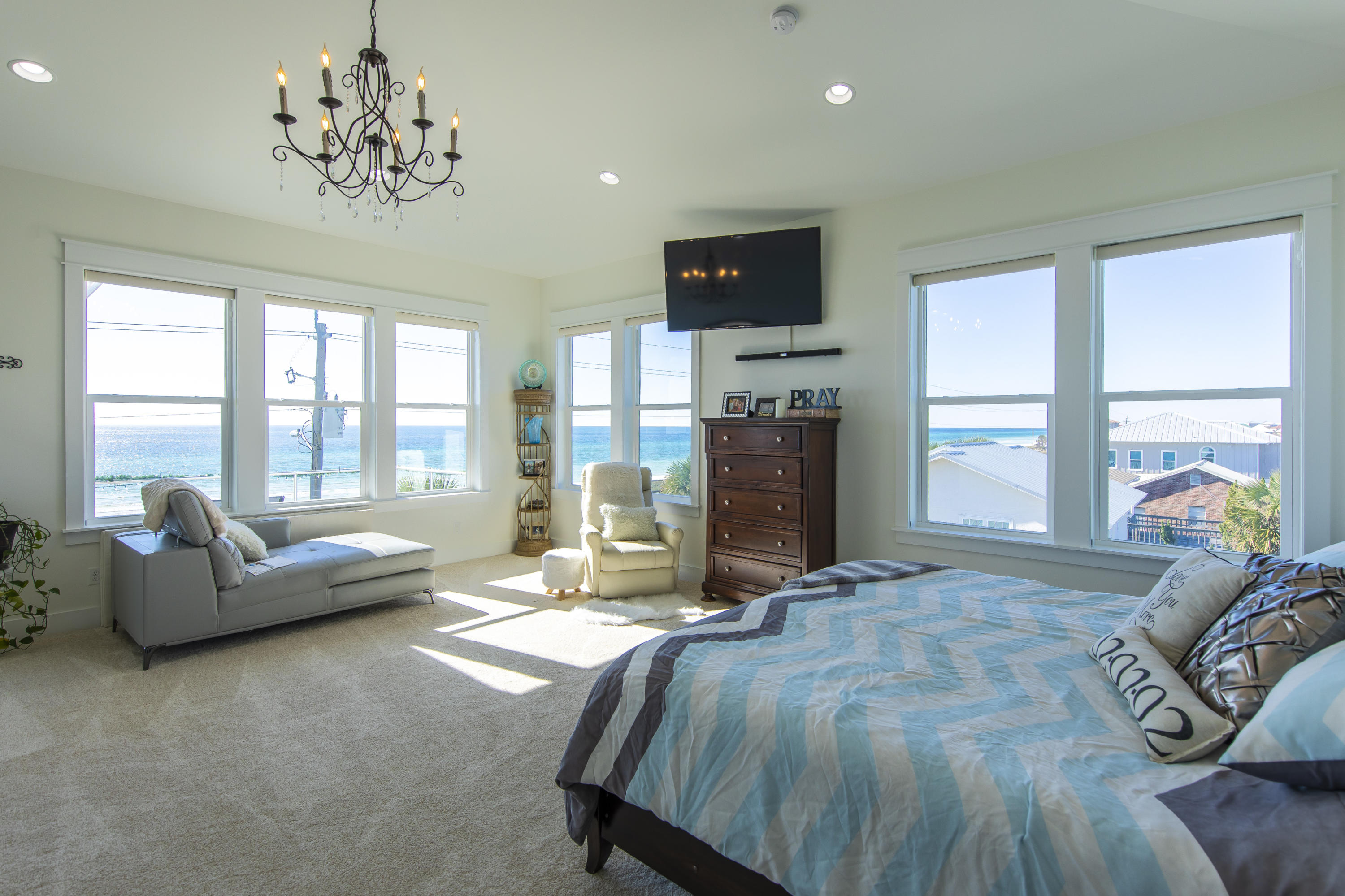 21222 Front Beach Road Panama City Beach, FL 32413 - Photo 52 of 60 a bed room with a bed and a couch