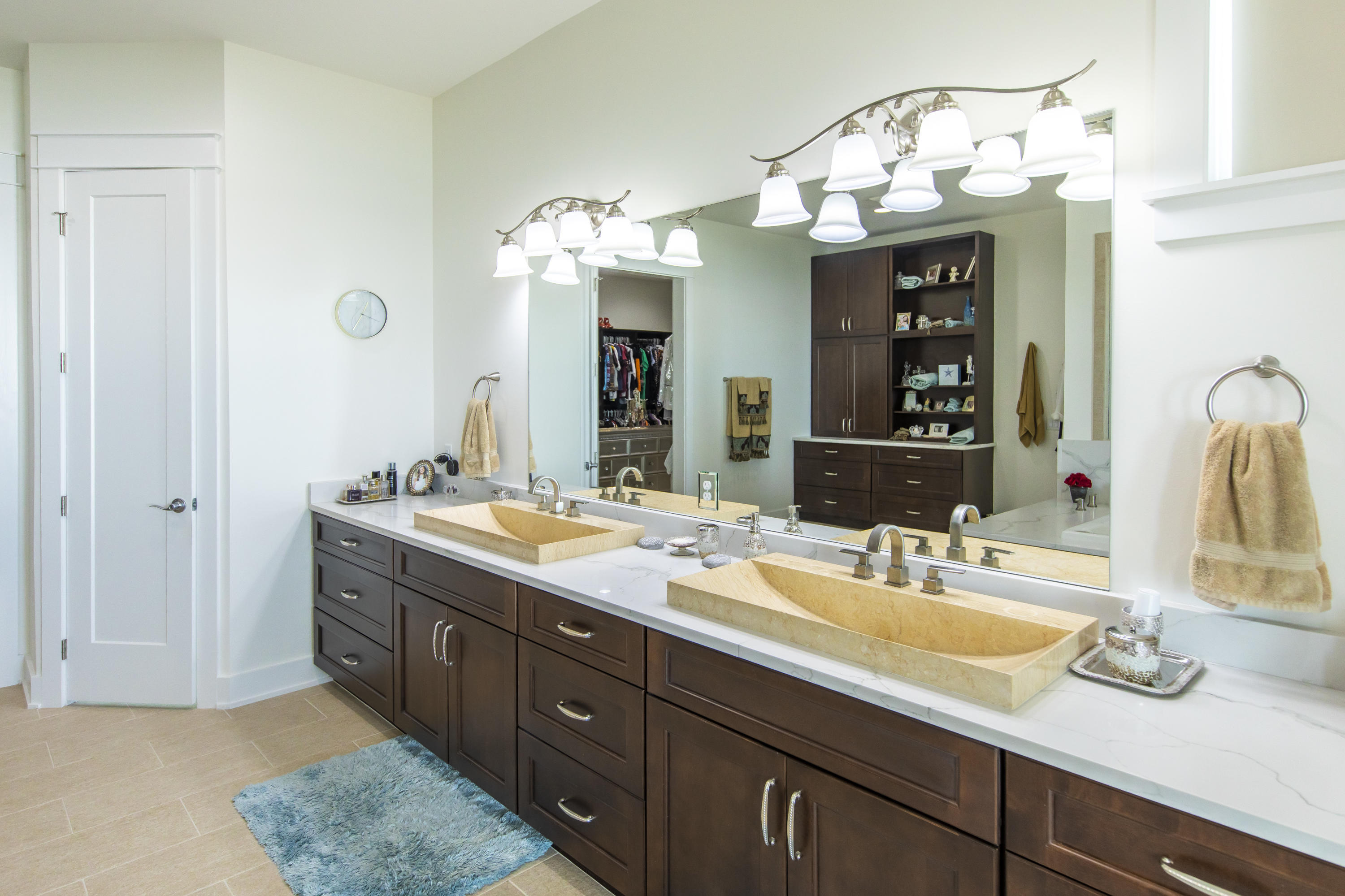 21222 Front Beach Road Panama City Beach, FL 32413 - Photo 55 of 60 a bathroom with a double vanity sink and a mirror