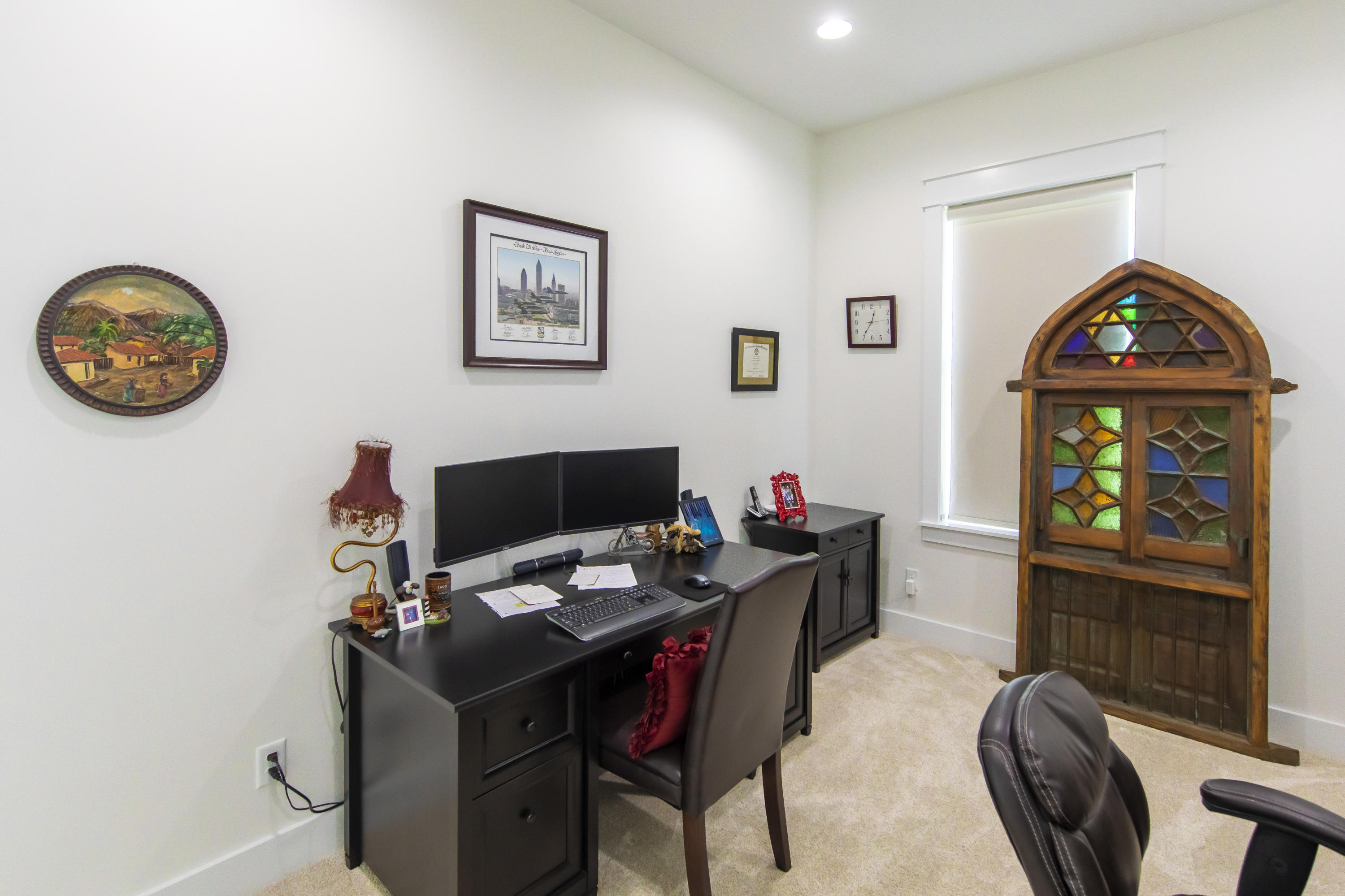 21222 Front Beach Road Panama City Beach, FL 32413 - Photo 59 of 60 a view of a workspace with furniture and a window