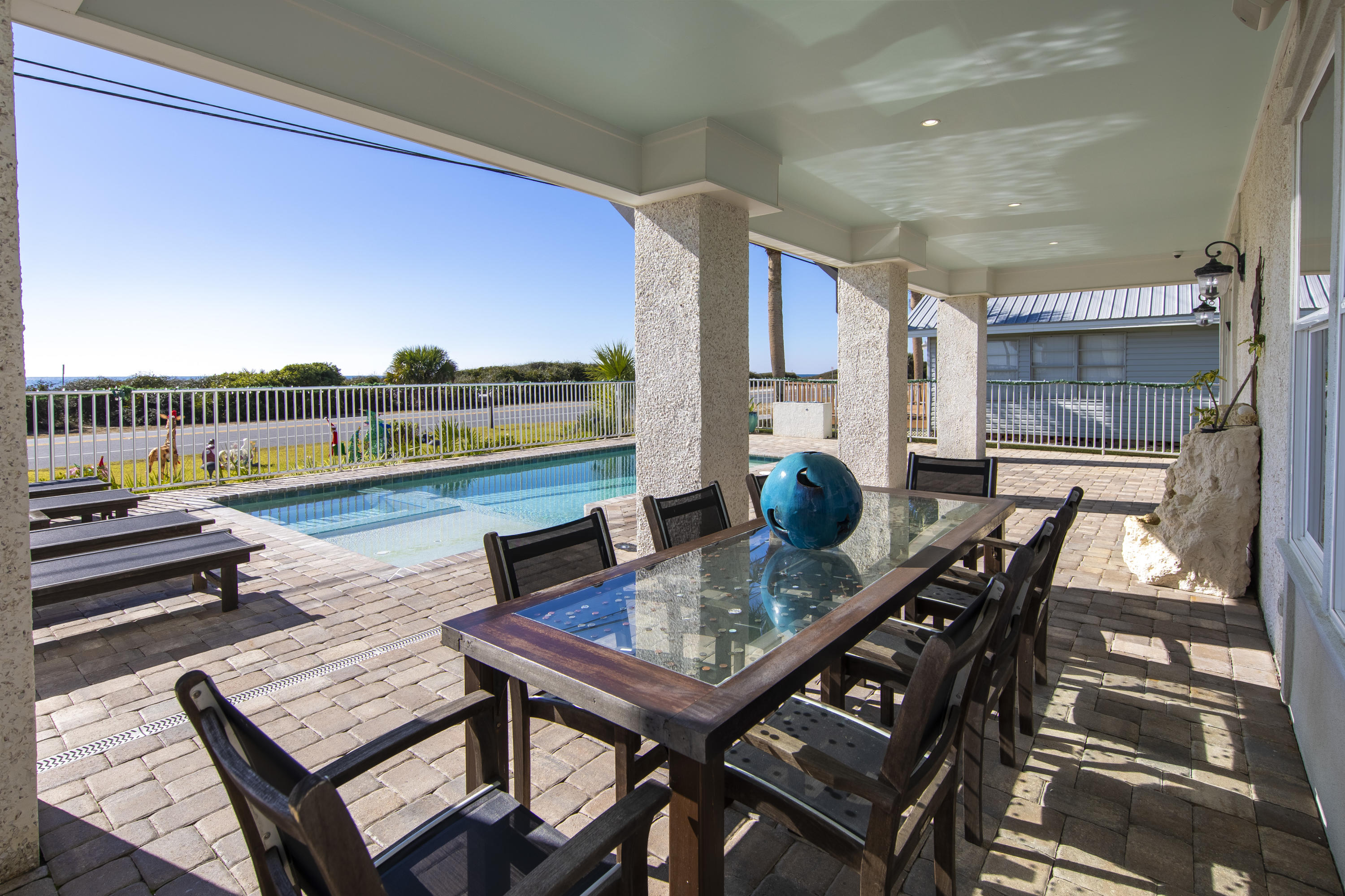21222 Front Beach Road Panama City Beach, FL 32413 - Photo 7 of 60 a view of a balcony dining area with furniture