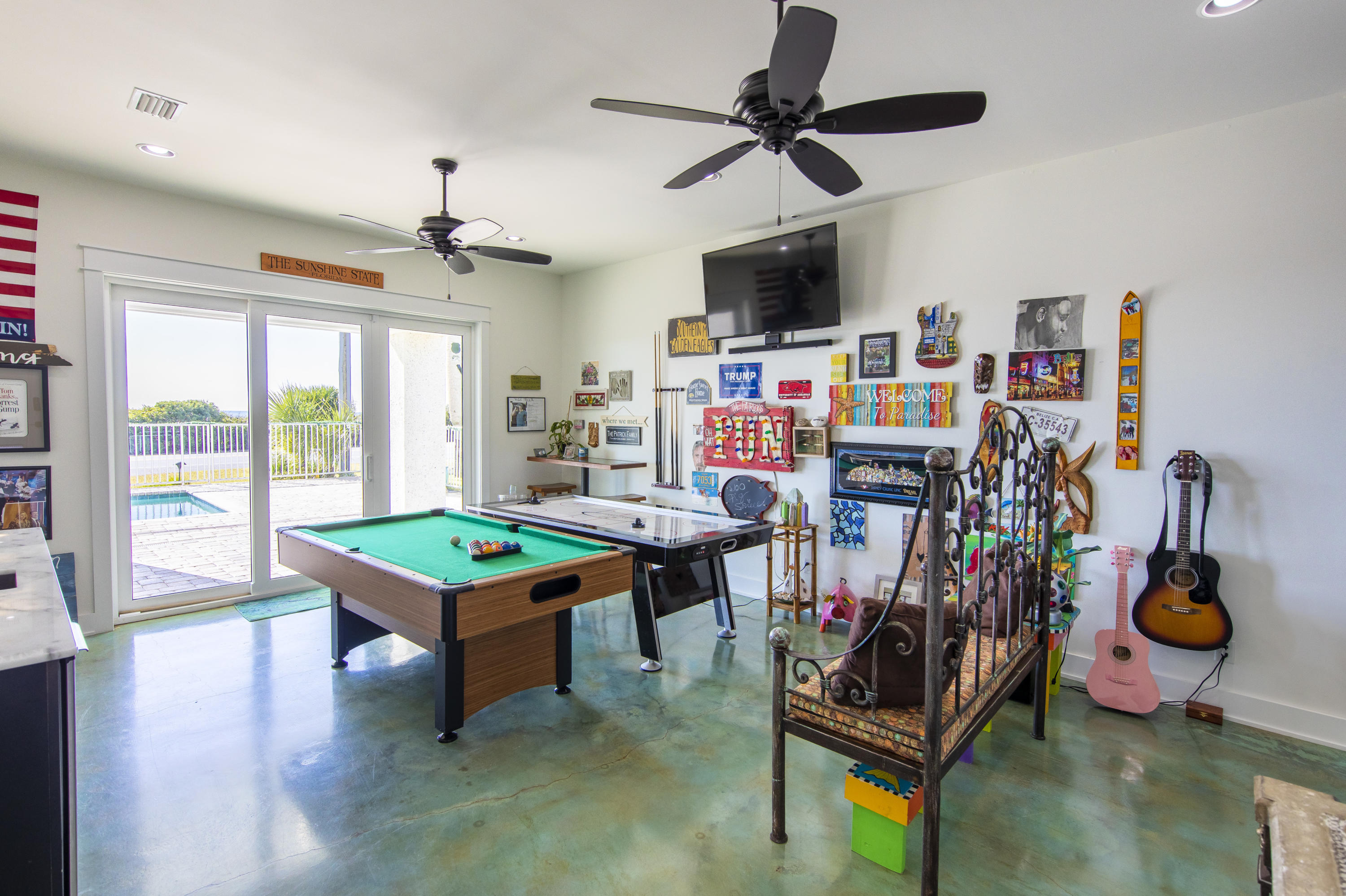 21222 Front Beach Road Panama City Beach, FL 32413 - Photo 8 of 60 a living room with lots of furniture and a flat screen tv