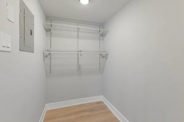 a view of a room with racks on the wall