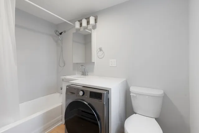 a bathroom with a sink and a toilet
