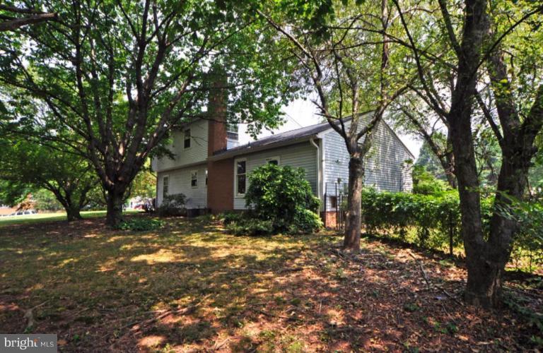 13601 Floris Street Herndon, VA 20171 - Photo 14 of 20 a view of a house with a tree