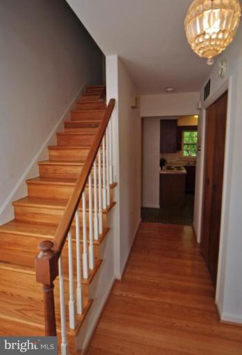 13601 Floris Street Herndon, VA 20171 - Photo 19 of 20 a view of entryway and hall with wooden floor
