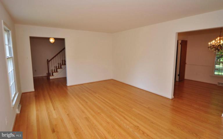 13601 Floris Street Herndon, VA 20171 - Photo 3 of 20 a view of empty room with wooden floor