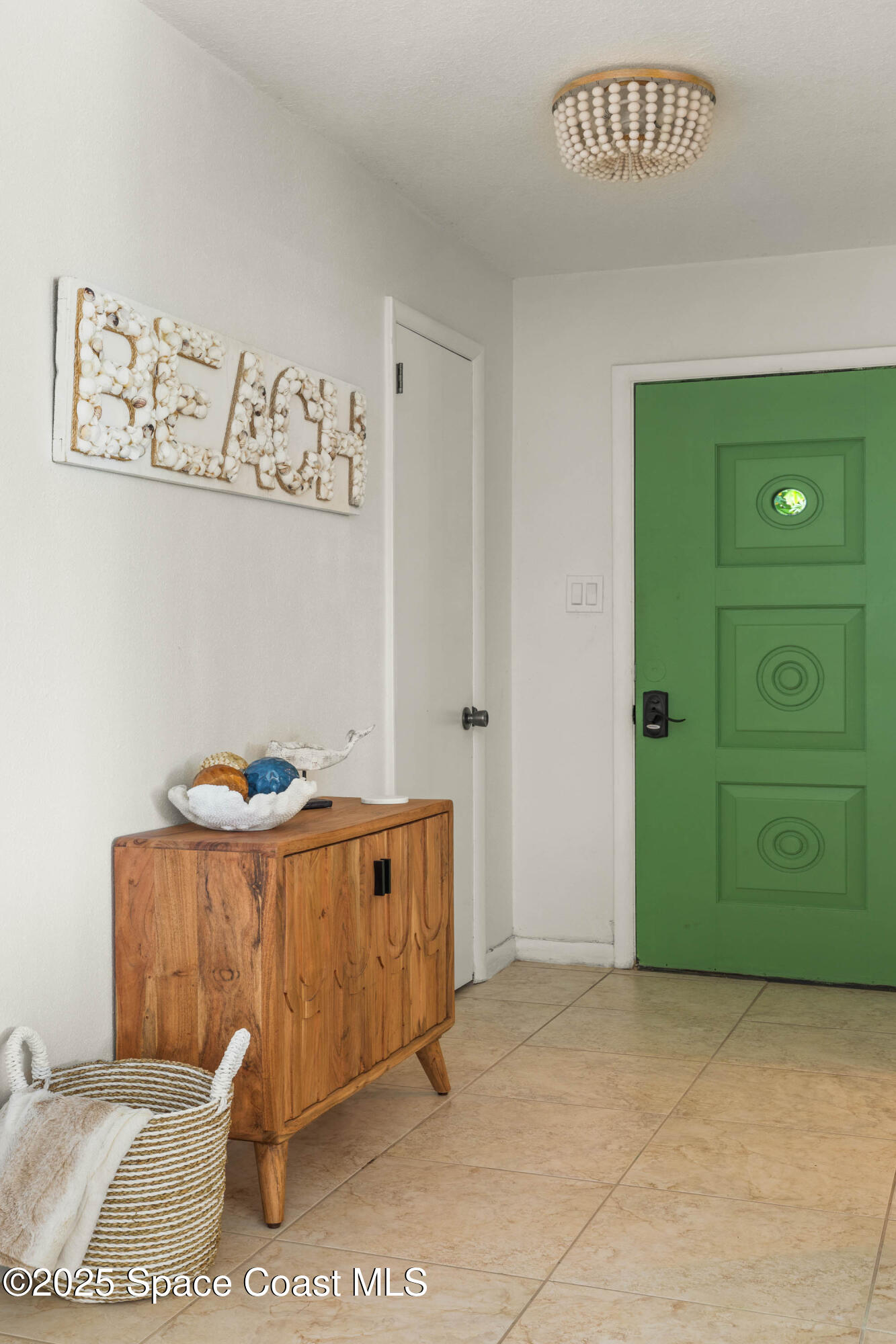 124 Aucila Road Cocoa Beach, FL 32931 - Photo 20 of 58 a view of a storage & utility room