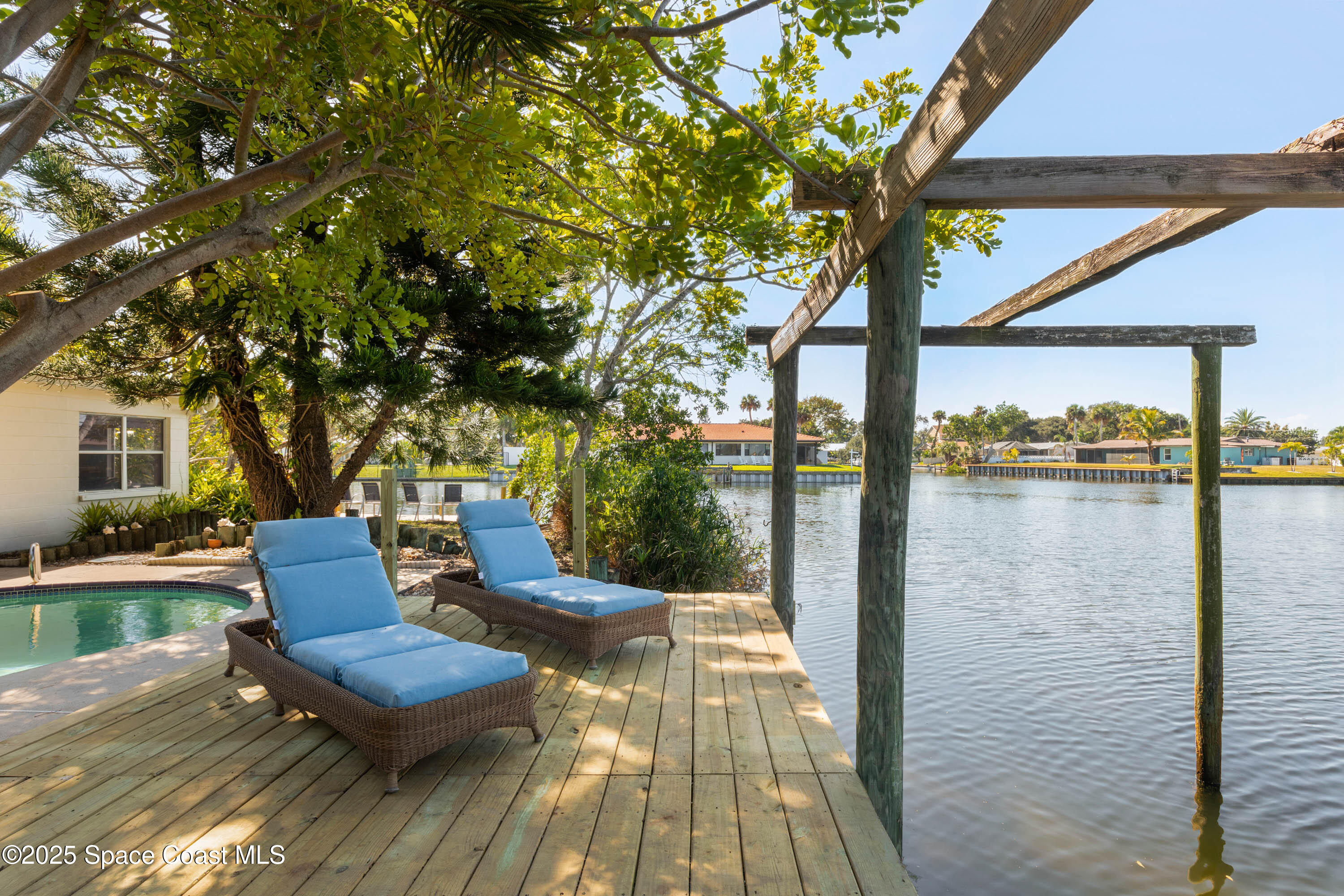 124 Aucila Road Cocoa Beach, FL 32931 - Photo 3 of 58 a view of outdoor space yard and patio