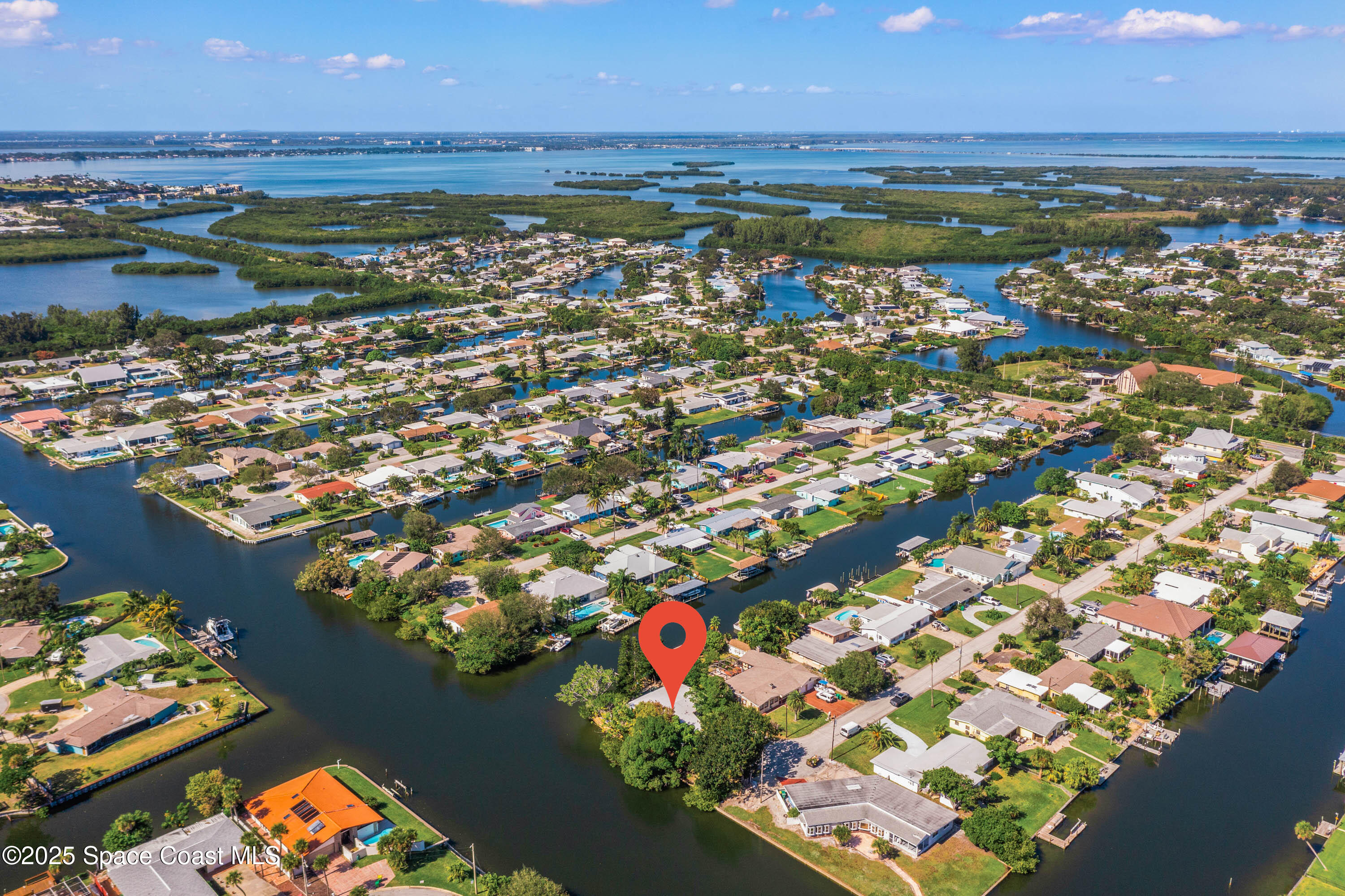 124 Aucila Road Cocoa Beach, FL 32931 - Photo 34 of 58 an aerial view of residential building with outdoor space ocean view