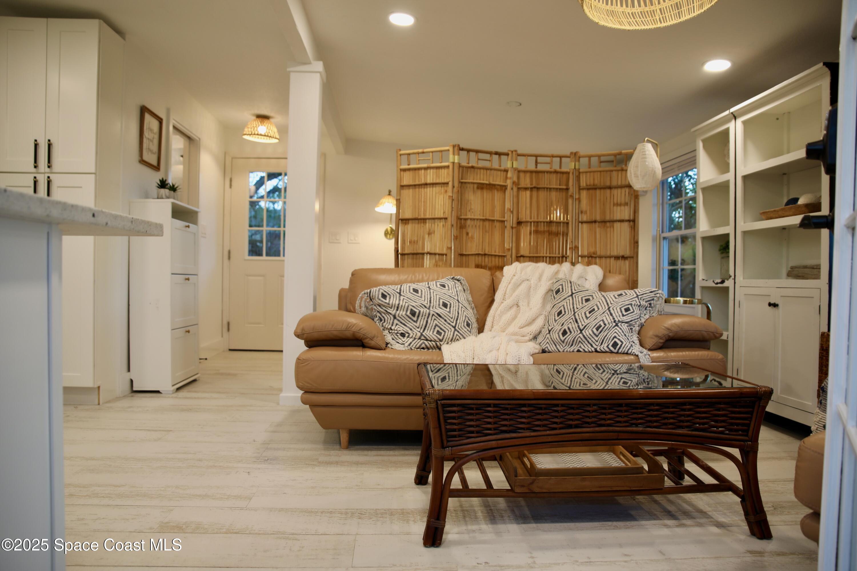 124 Aucila Road Cocoa Beach, FL 32931 - Photo 52 of 58 a living room with furniture