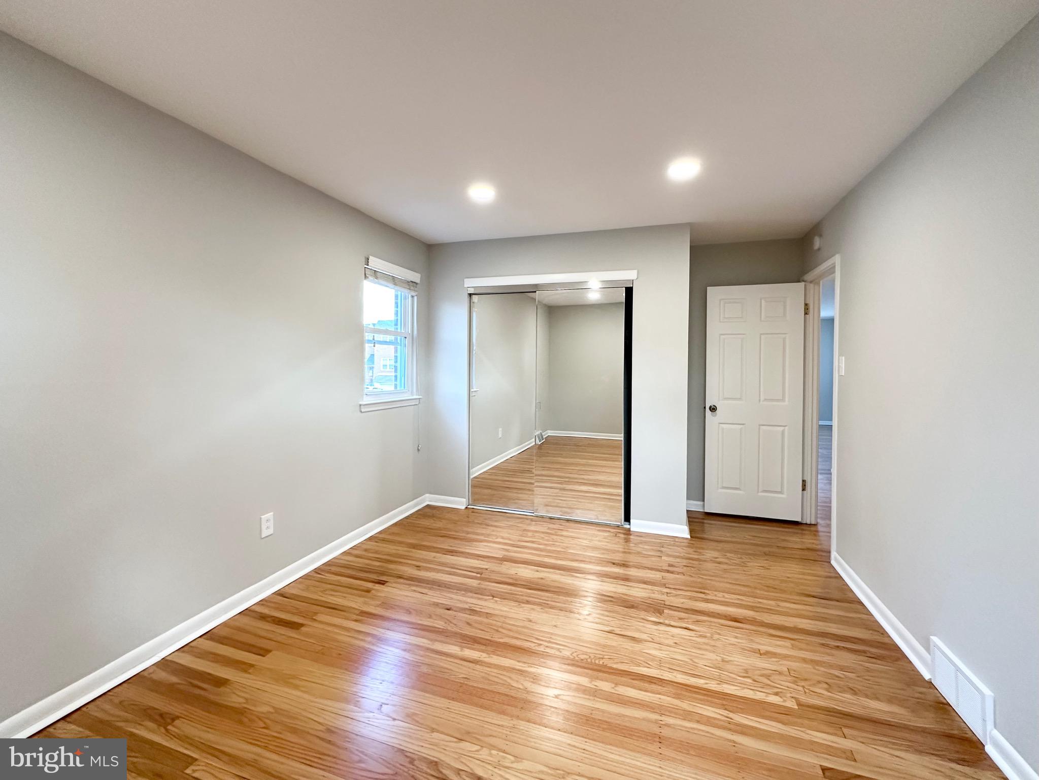 3746 Genesee Drive Philadelphia, PA 19154 - Photo 17 of 21 a view of empty room with wooden floor