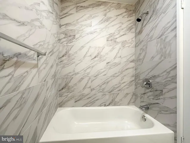 a bathroom with a bathtub