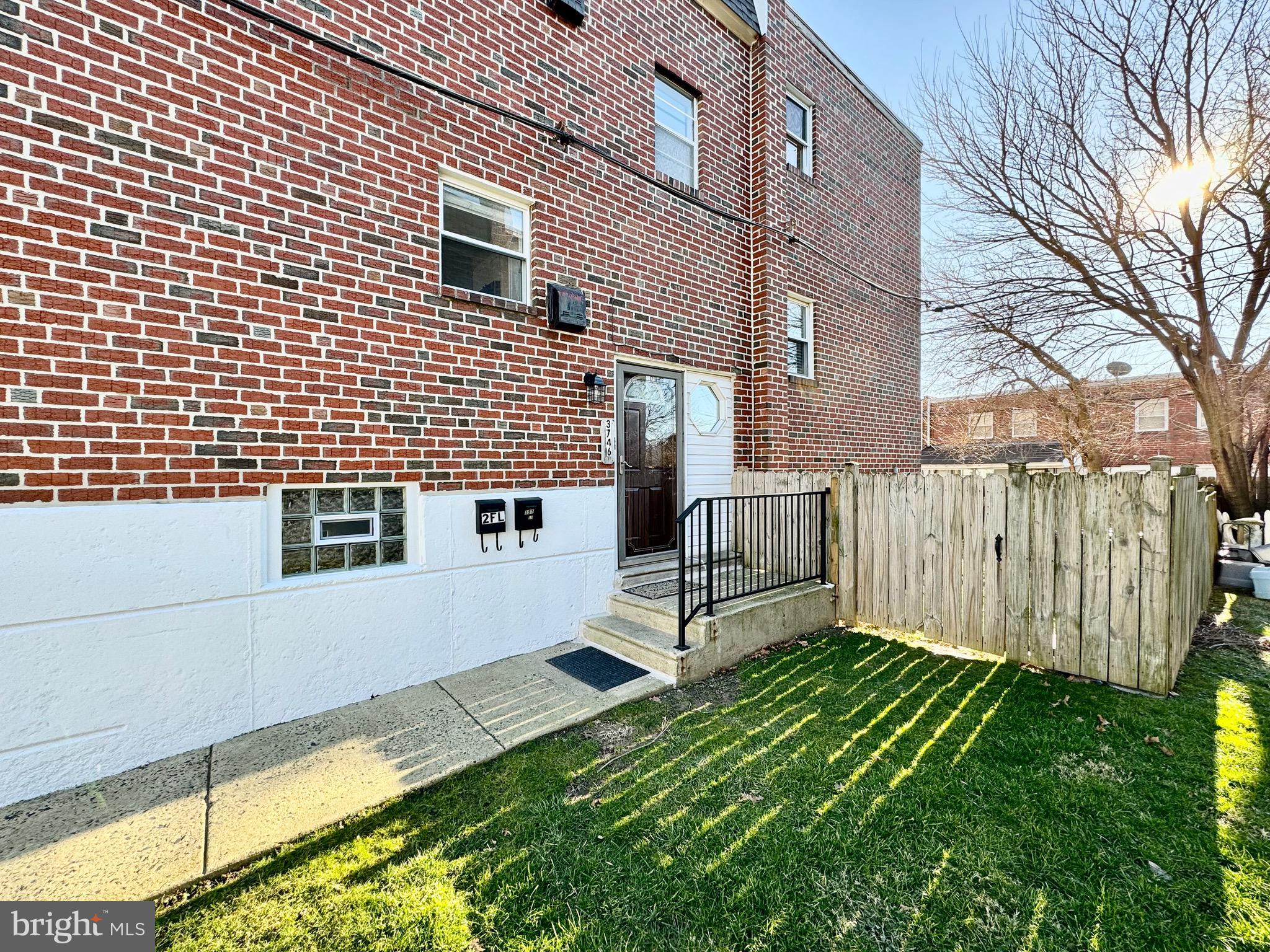 3746 Genesee Drive Philadelphia, PA 19154 - Photo 4 of 21 a view of backyard with a chair under a large tree