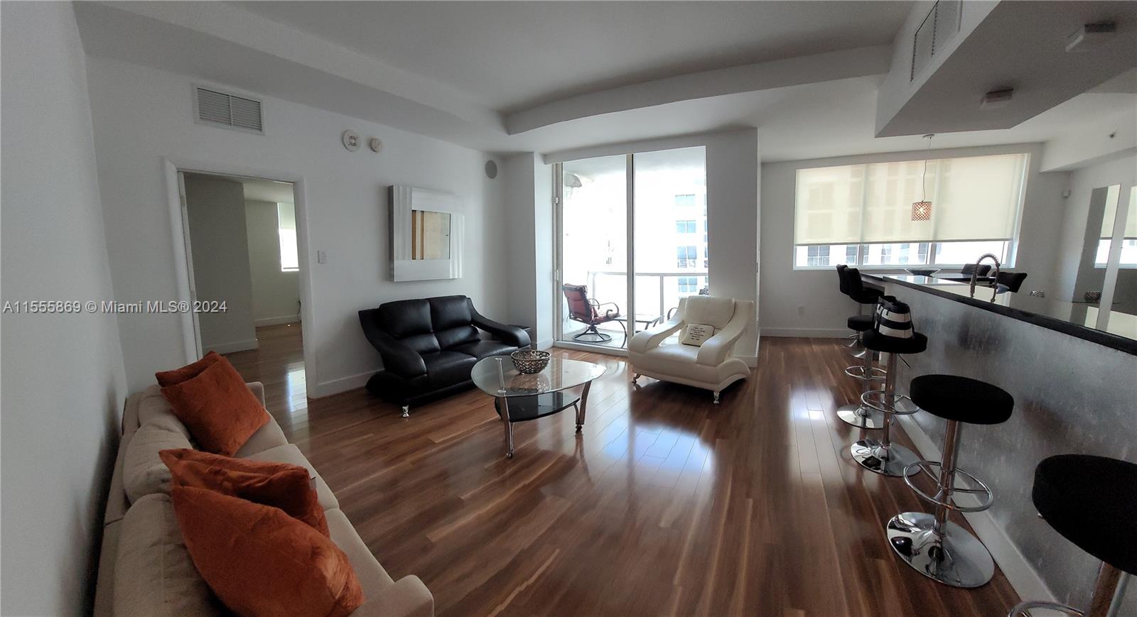 Miami Central Business District Miami, FL 33132 - Photo 13 of 17 a living room with furniture and a large window