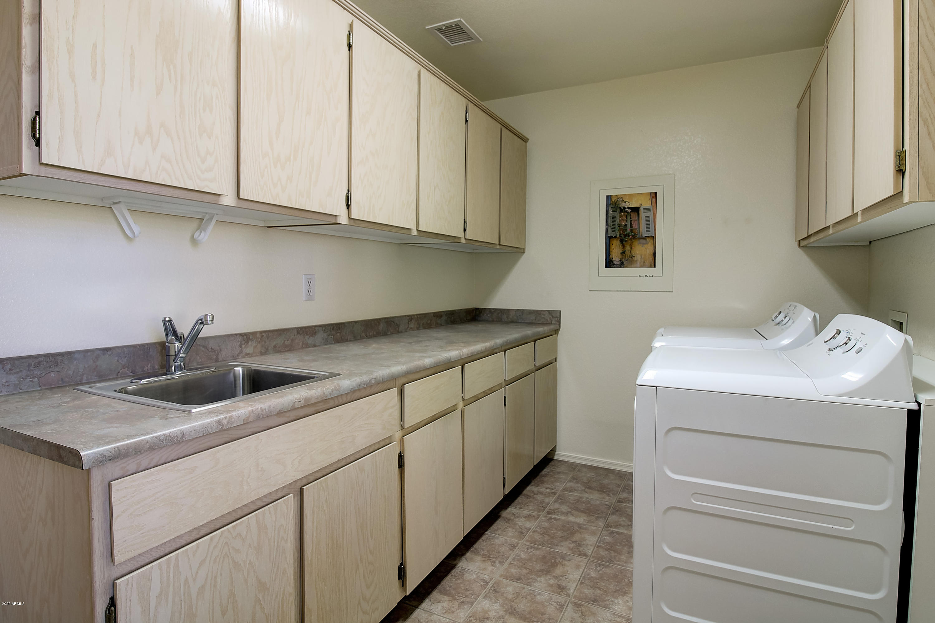 15311 West Piccadilly Road Goodyear, AZ 85395 - Photo 23 of 29 Large Laundry Room
