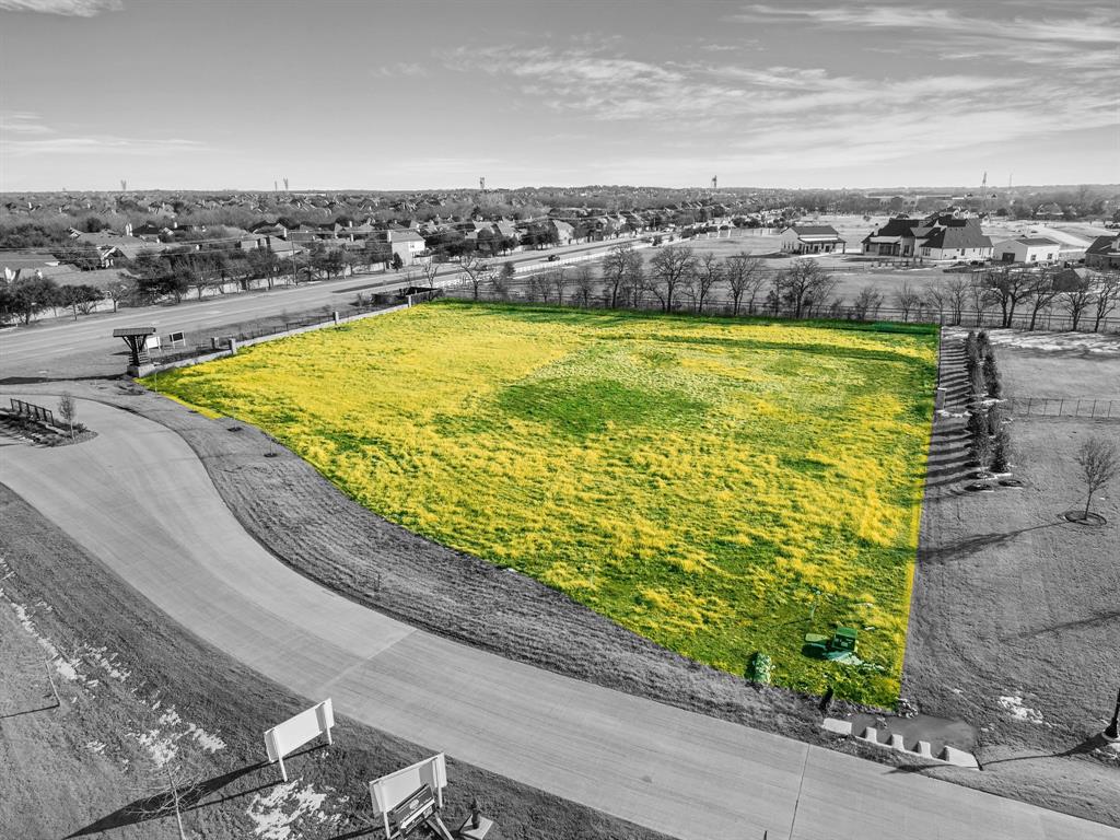 1502 Clydesdale Road Bartonville, TX 76226 - Photo 2 of 7 a view of a swimming pool and an ocean view