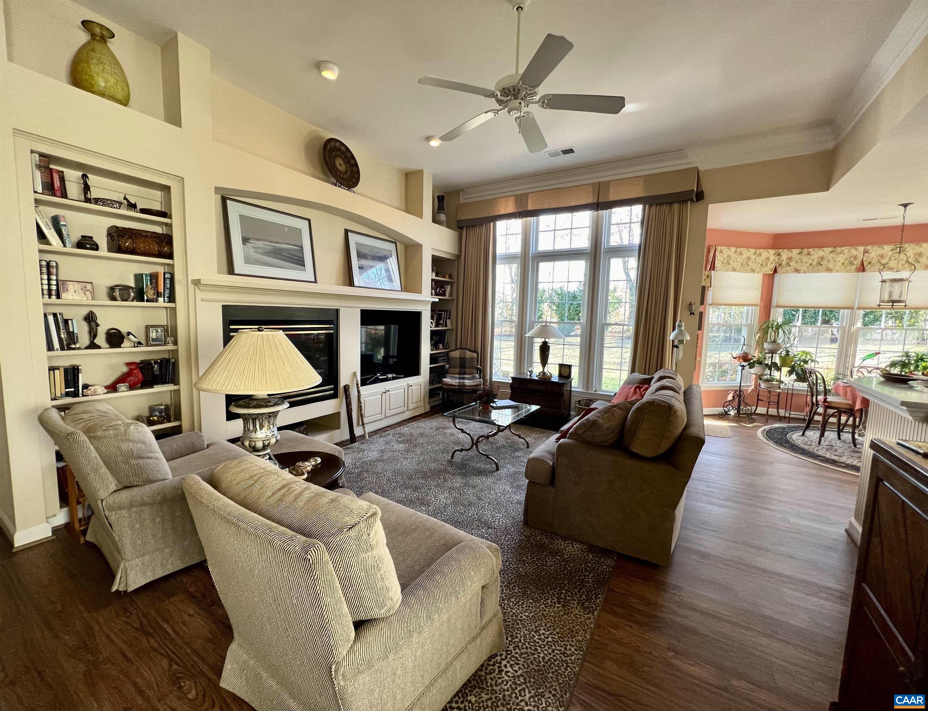 2118 Shepherds Ridge Road Charlottesville, VA 22901 - Photo 13 of 27 a living room with furniture ceiling fan and a large window