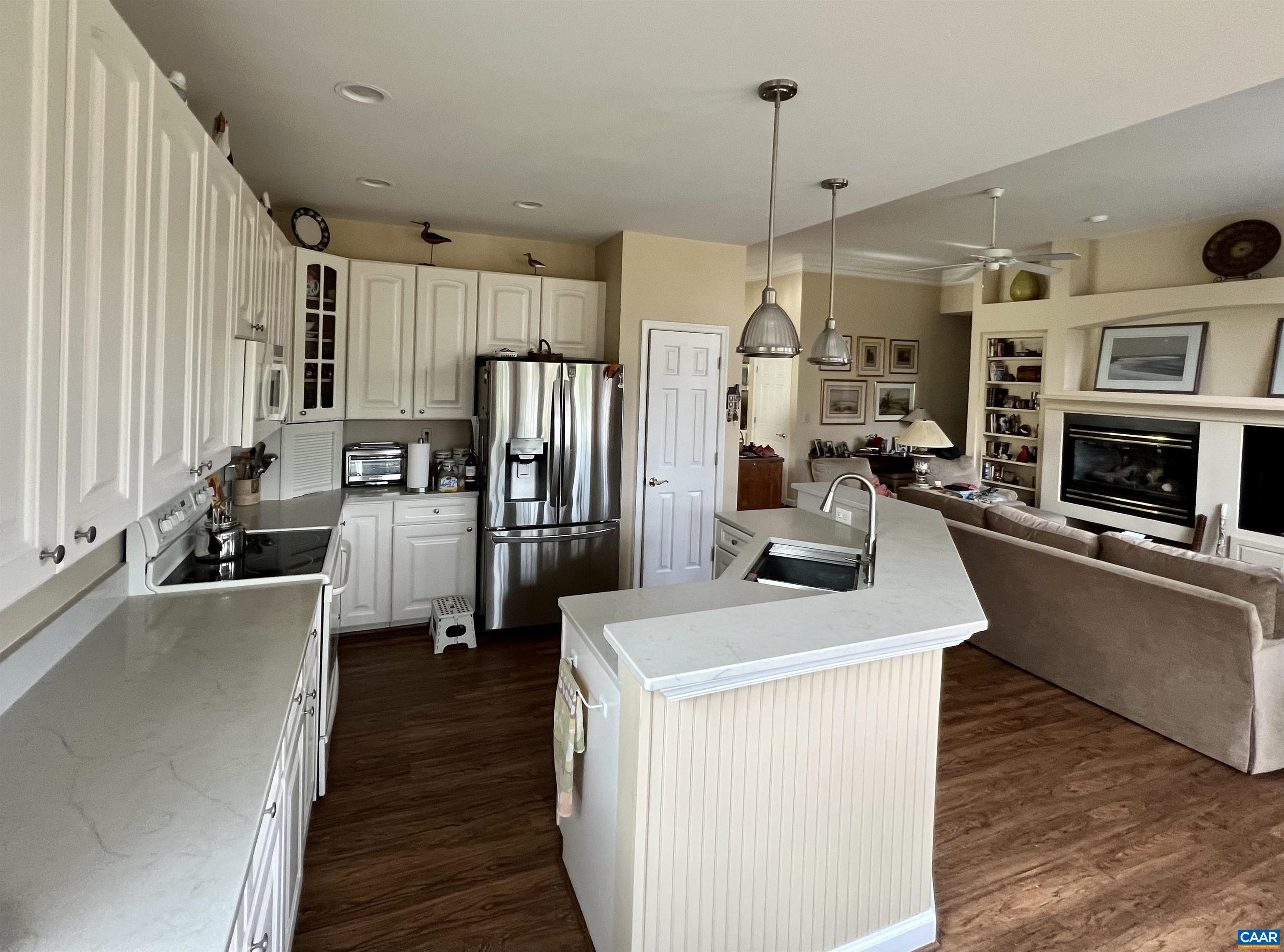 2118 Shepherds Ridge Road Charlottesville, VA 22901 - Photo 17 of 27 a kitchen with stainless steel appliances a stove a refrigerator a oven a sink and a refrigerator