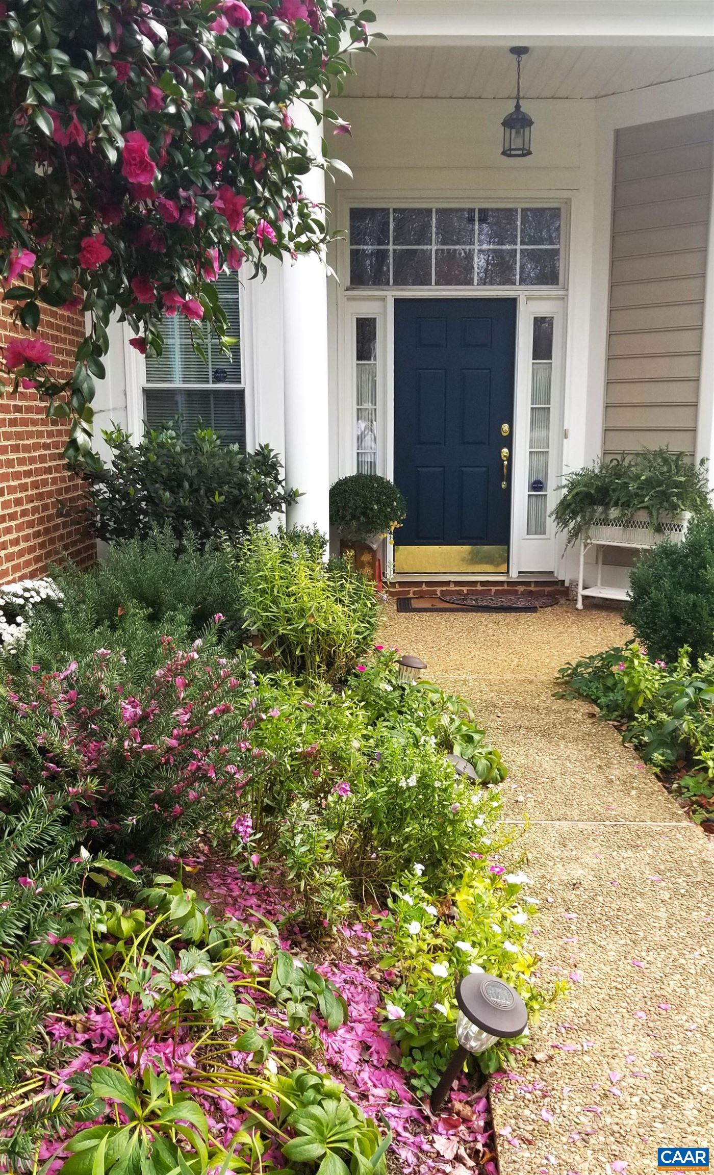 2118 Shepherds Ridge Road Charlottesville, VA 22901 - Photo 2 of 27 a view of a house with potted plants