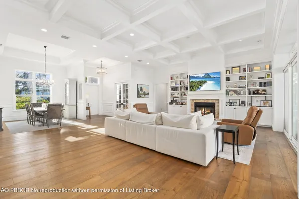 a kitchen with stainless steel appliances a sink stove and cabinets