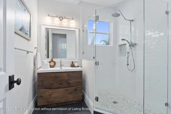 a view of a swimming pool with an outdoor space and seating area