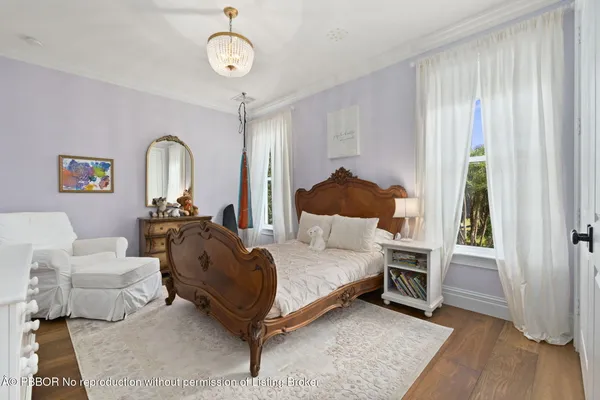 a view of a chairs and table on the balcony