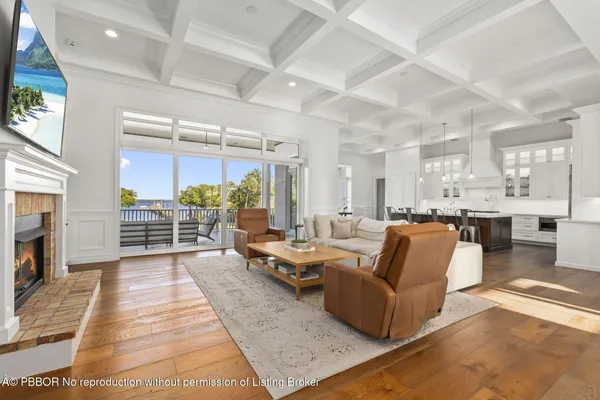 a kitchen with counter top space and wooden floor