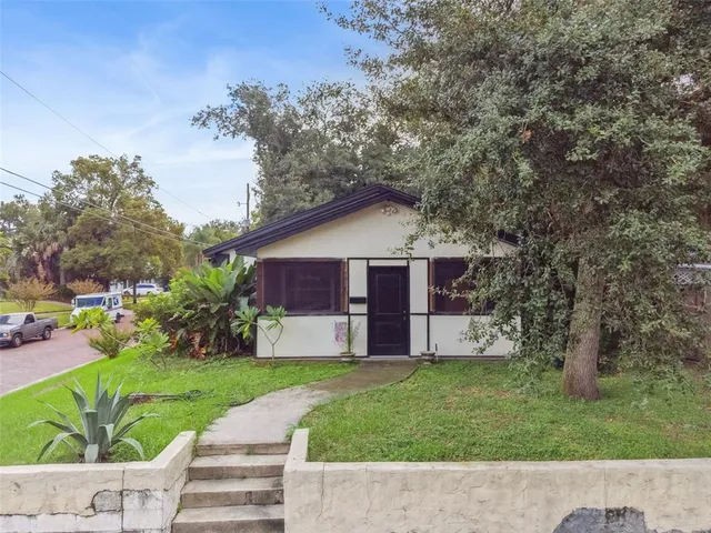 a house view with a garden space