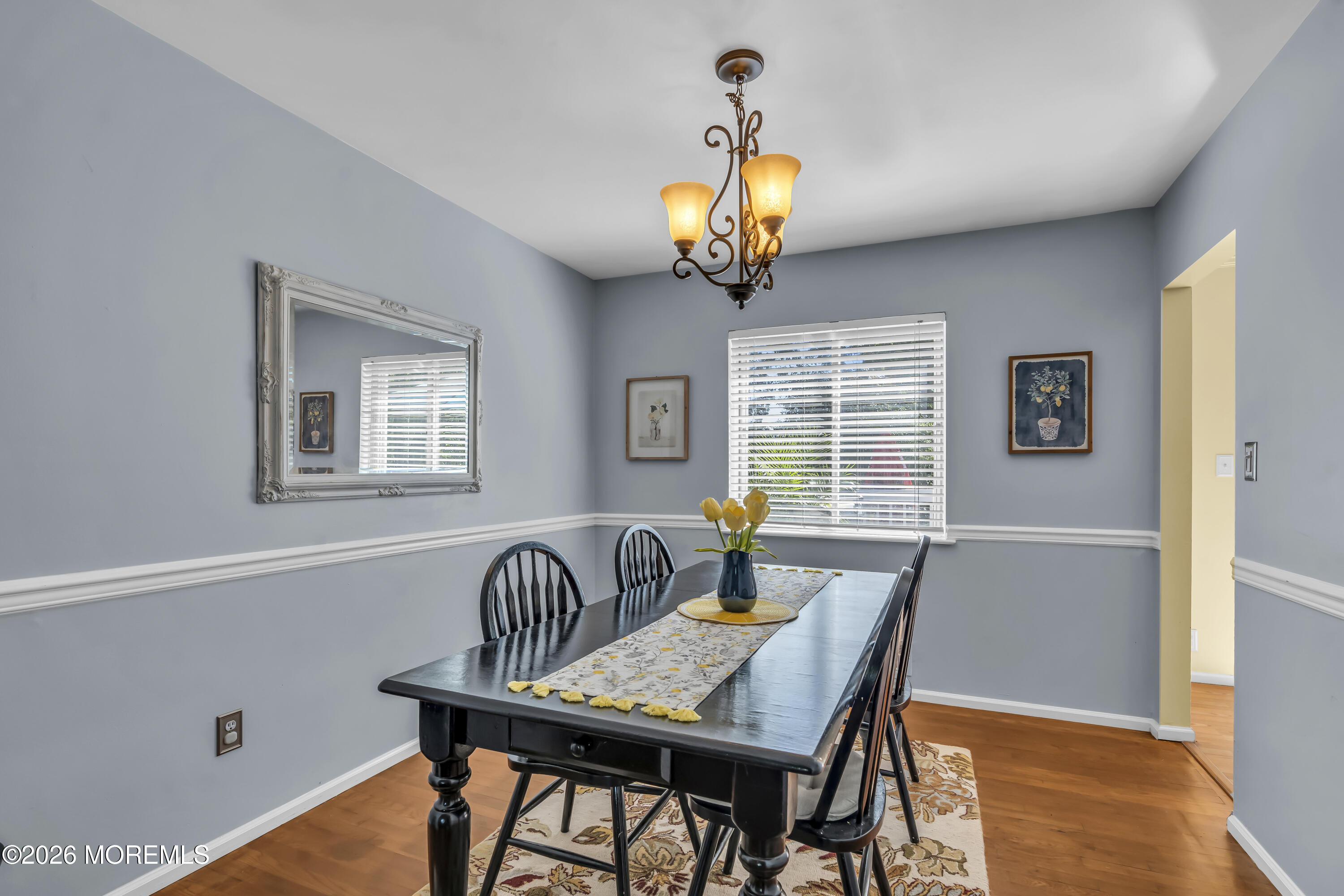 18 Claire Circle Howell, NJ 07731 - Photo 14 of 41 a view of a dining room with furniture and wooden floor