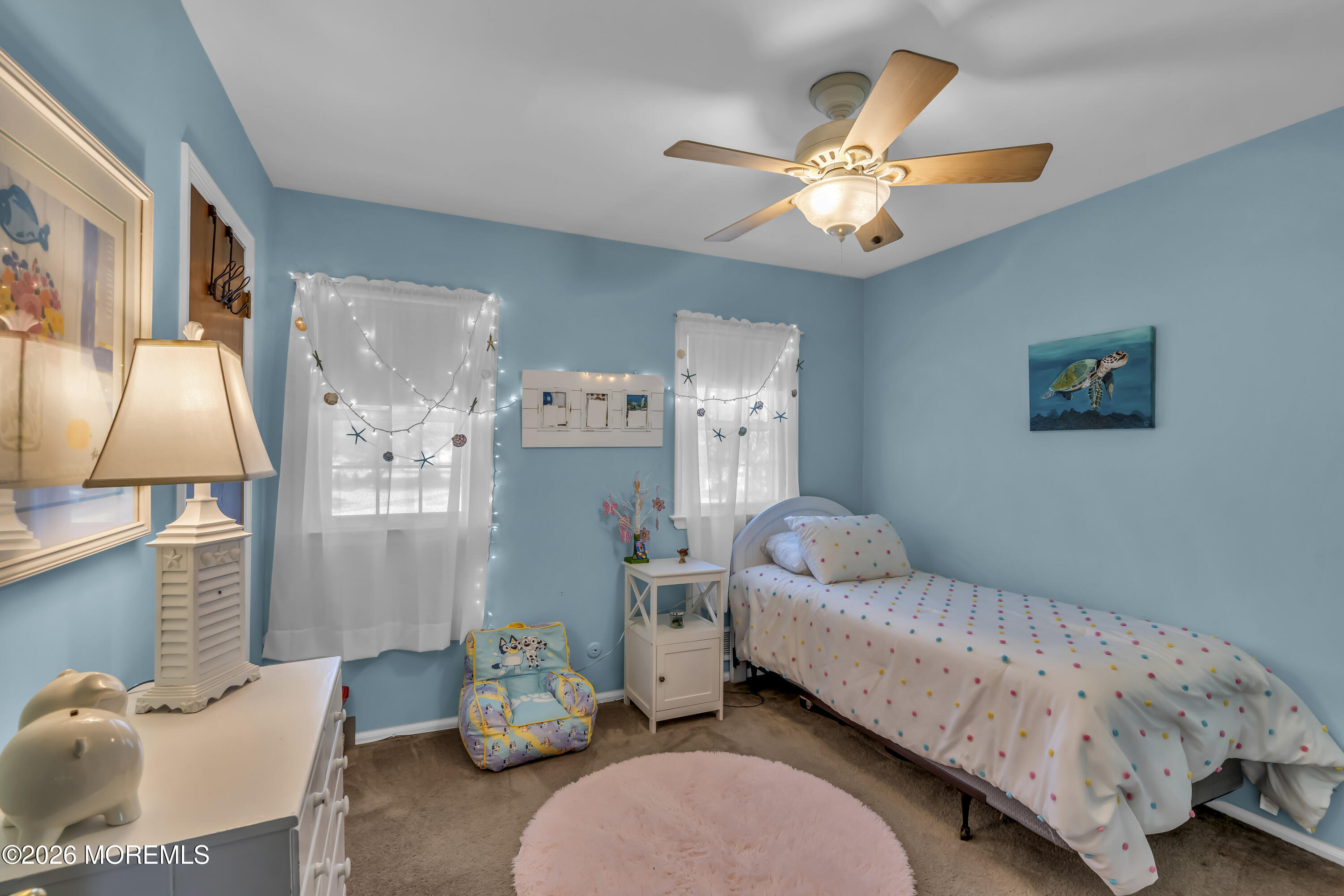 18 Claire Circle Howell, NJ 07731 - Photo 22 of 41 a bedroom with a bed and a chandelier