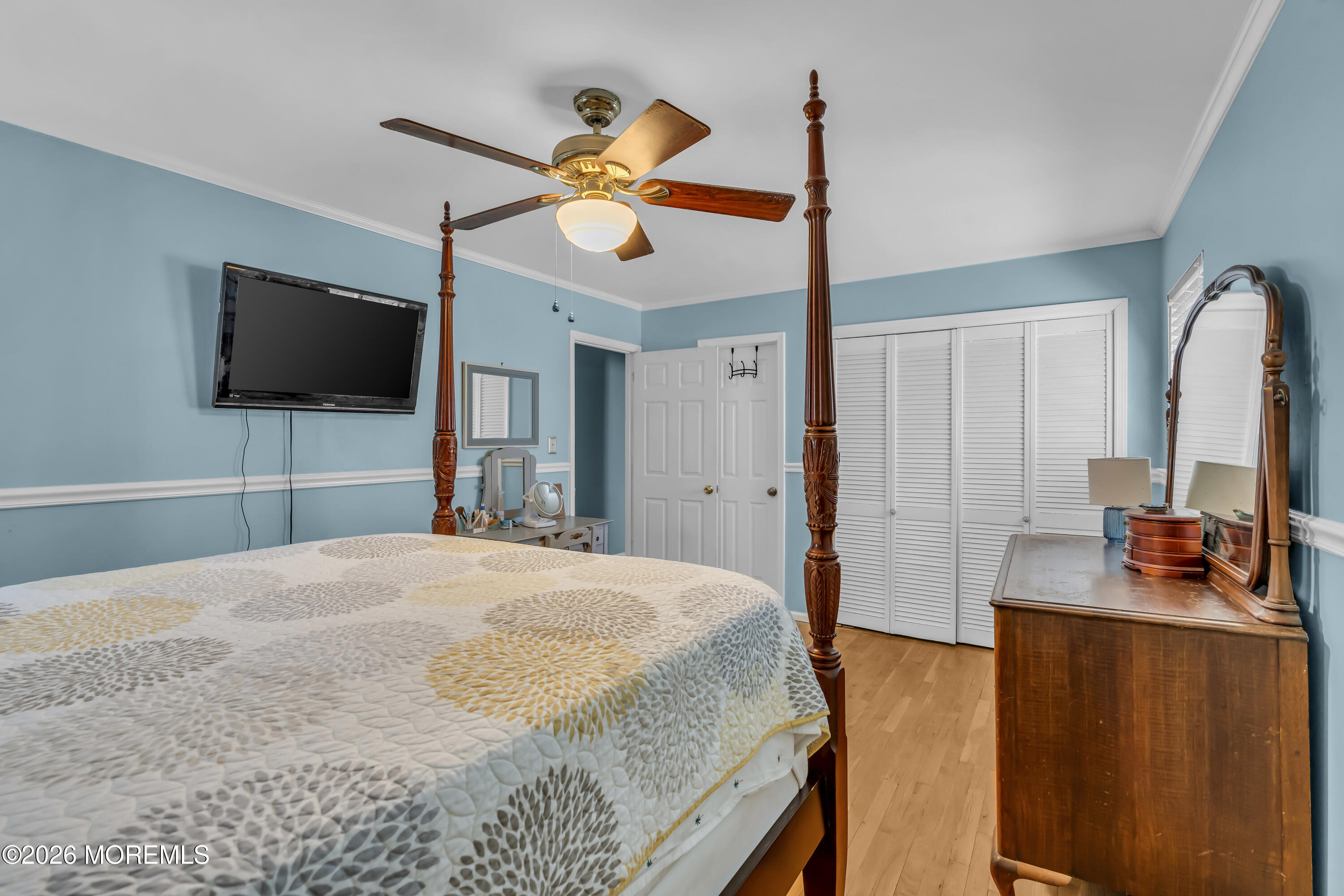 18 Claire Circle Howell, NJ 07731 - Photo 25 of 41 a bedroom with a bed and a flat screen tv
