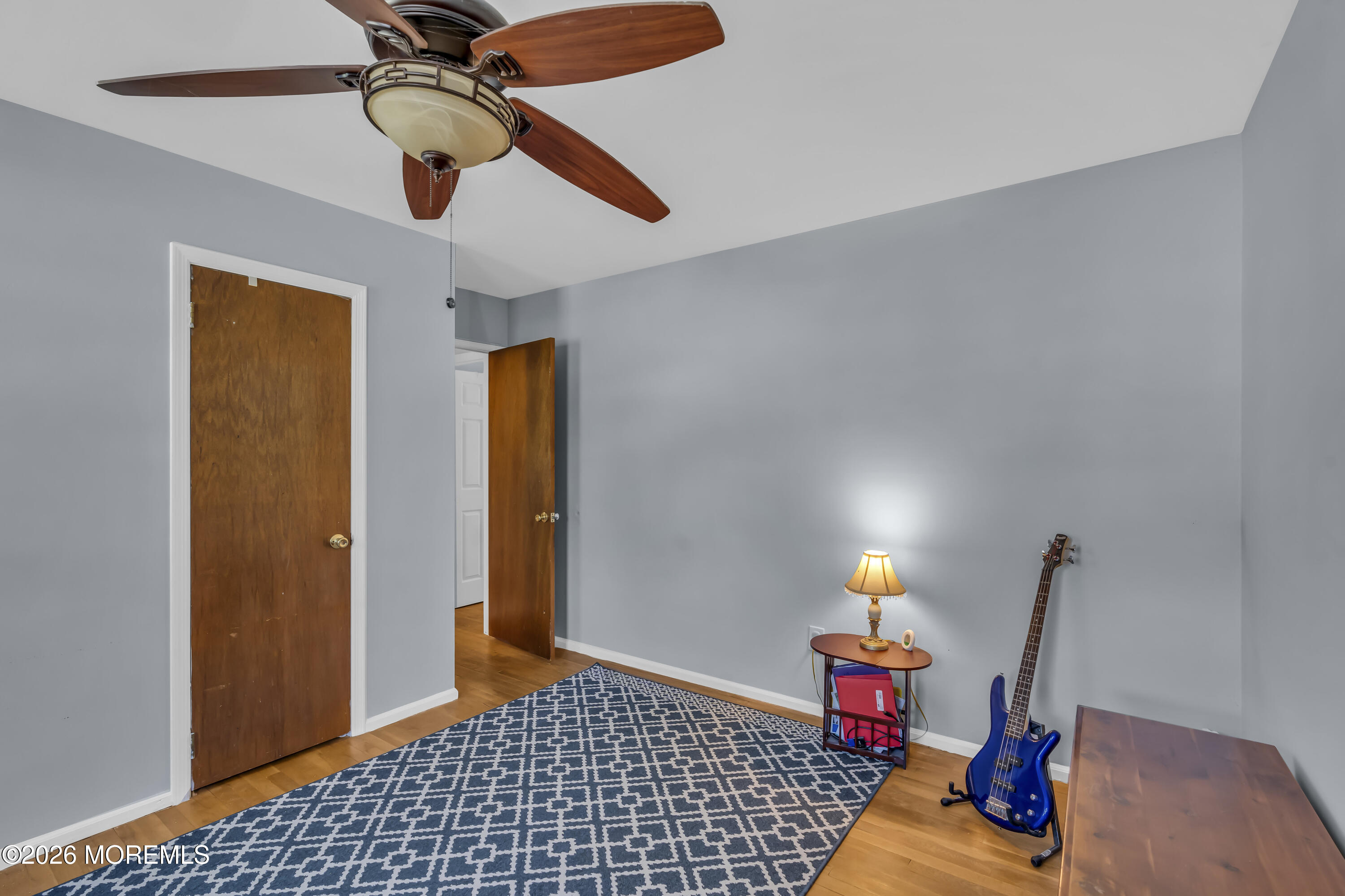 18 Claire Circle Howell, NJ 07731 - Photo 28 of 41 a bedroom with bed and a chandelier