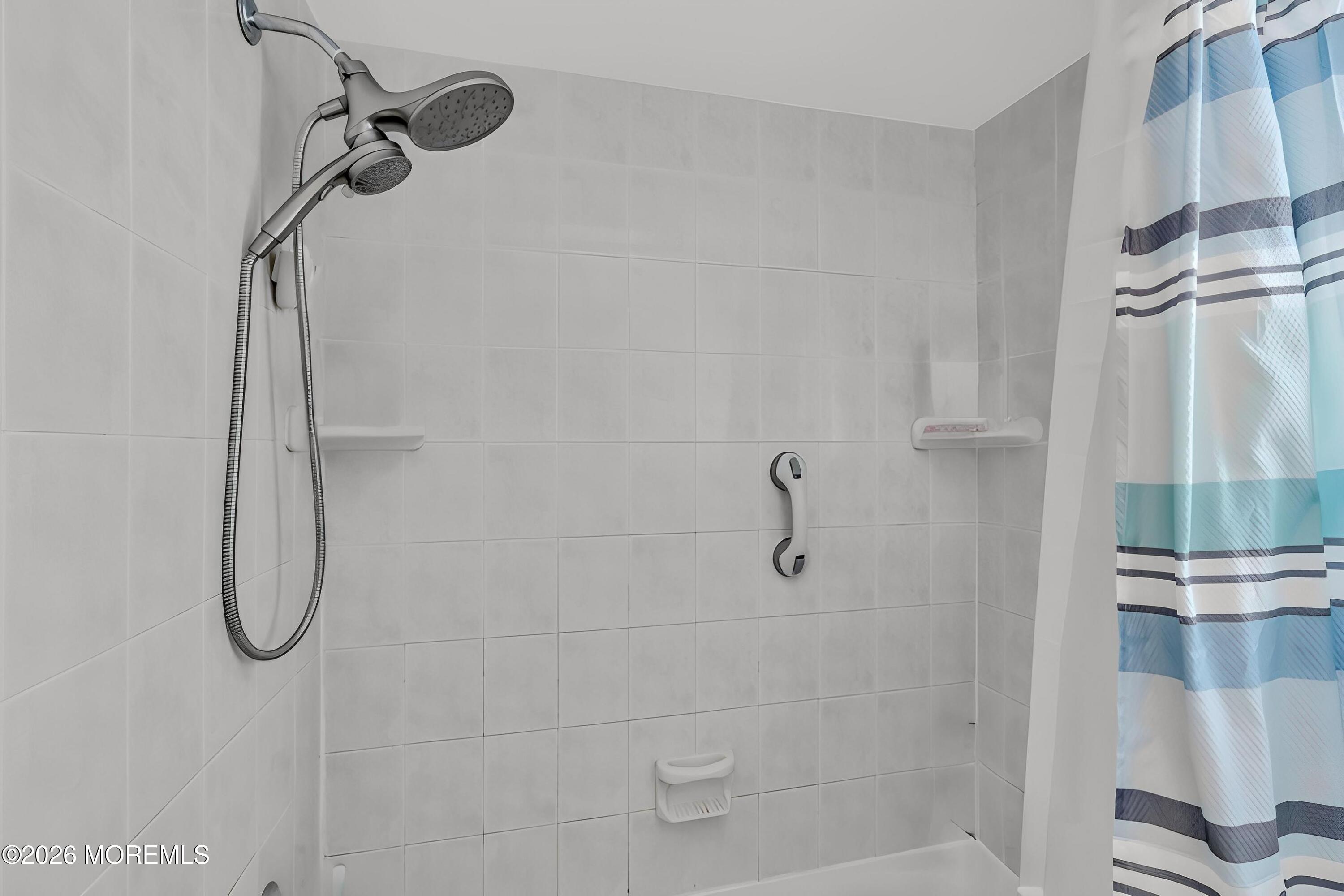 18 Claire Circle Howell, NJ 07731 - Photo 9 of 41 a bathroom with a shower