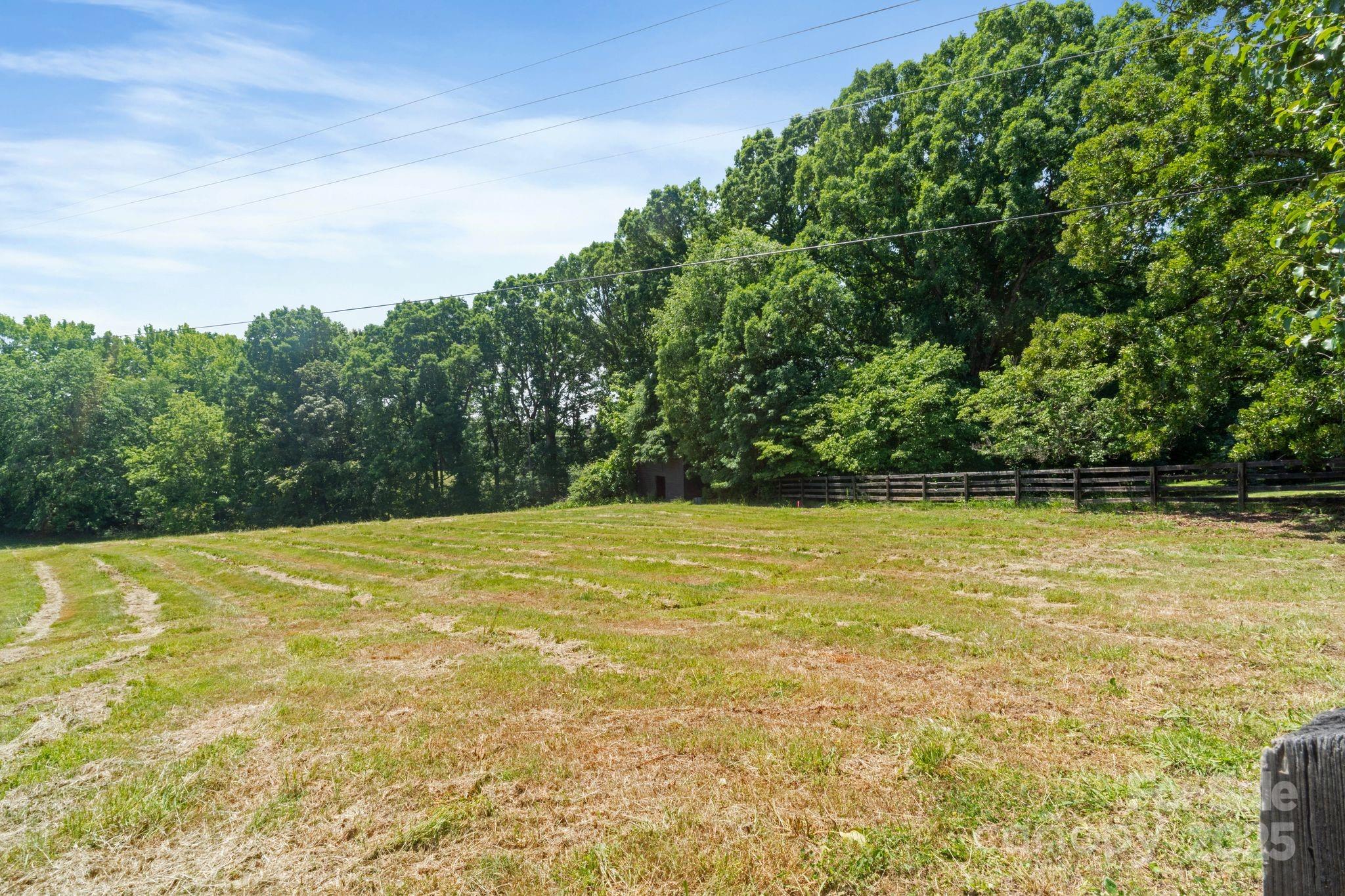 21121 Shearer Road, Unit 2 & 3 Davidson, NC 28036 - Photo 7 of 12 a view of a swimming pool and an outdoor space