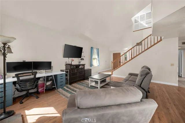 a kitchen with a stove window and cabinets