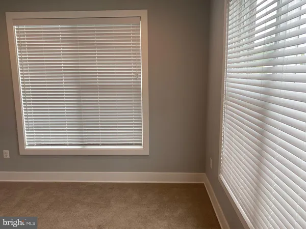 a view of a room that has a window in it