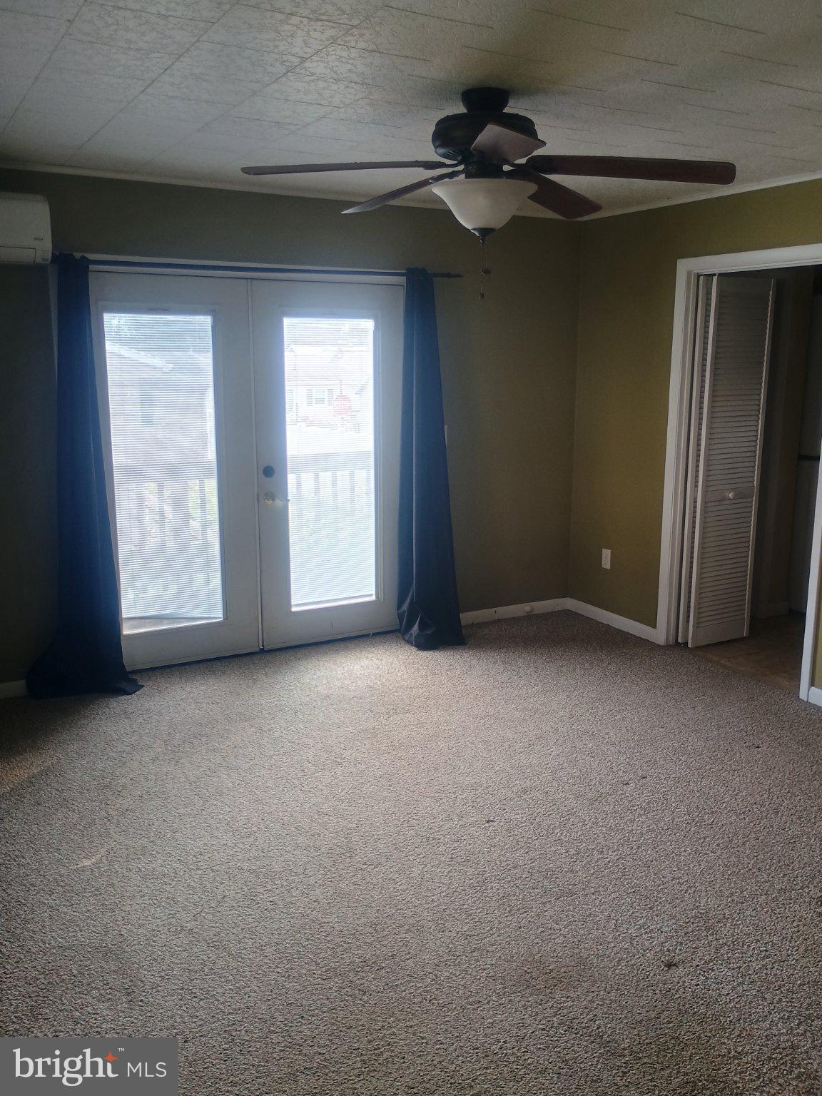 306 Ridgley Street Orbisonia, PA 17243 - Photo 8 of 21 Bright and airy living space awaits.