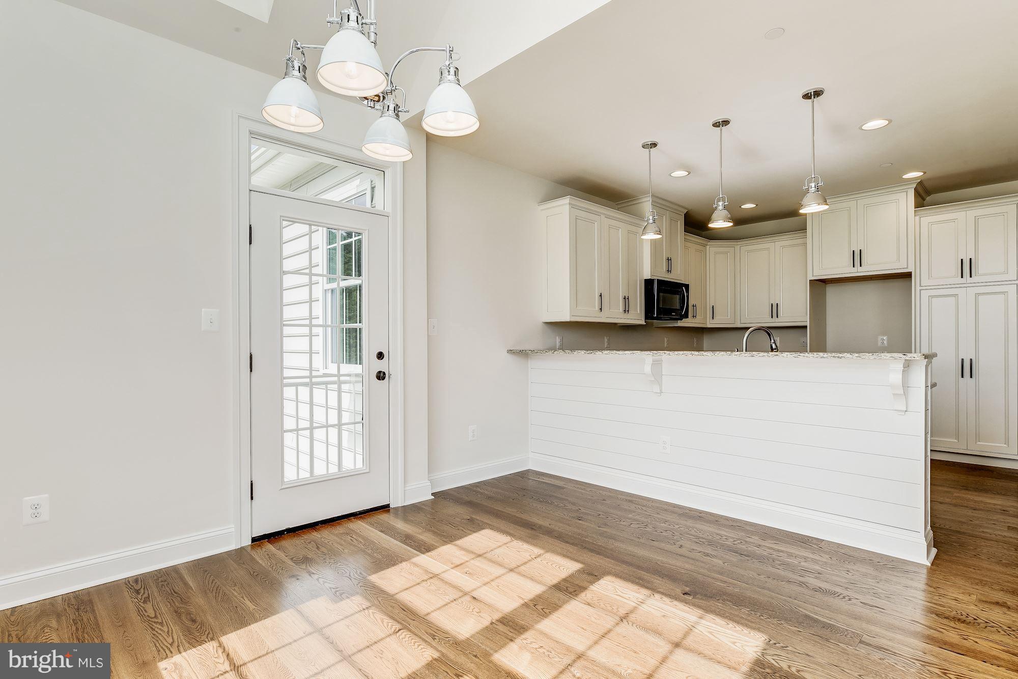 3664 Hooper Road New Windsor, MD 21776 - Photo 7 of 30 a view of a kitchen with marble kitchen and kitchen