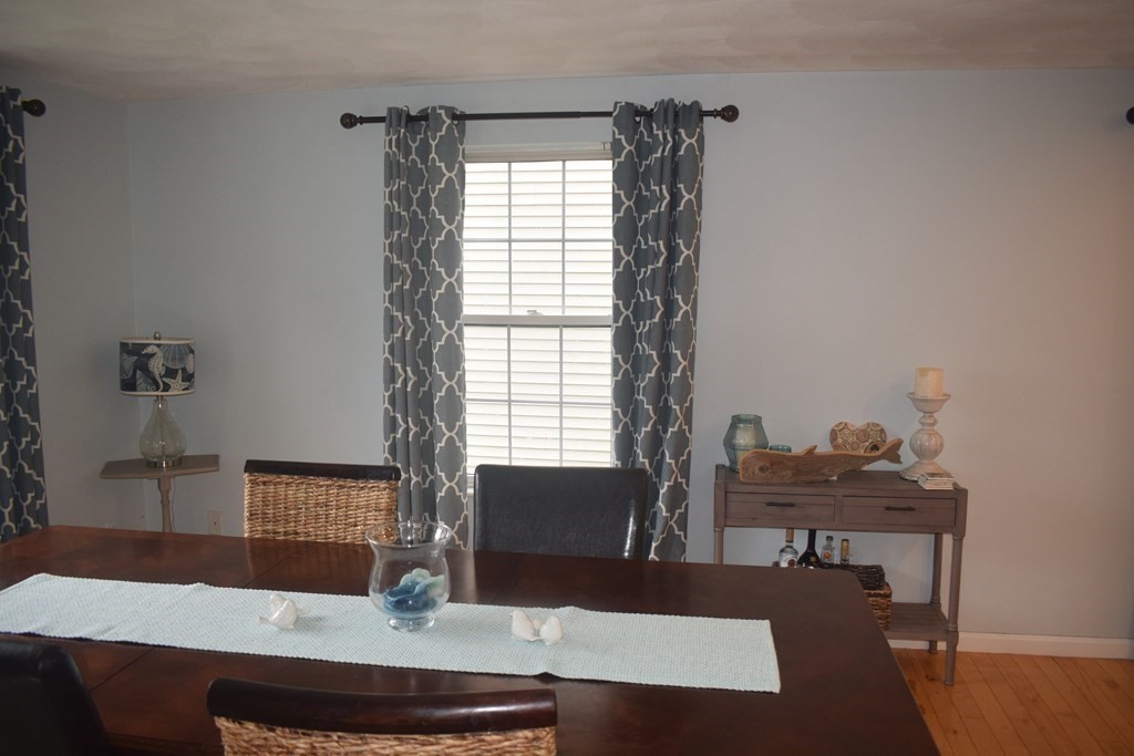 68 Meadowood Road North Andover, MA 01845 - Photo 15 of 40 a room with furniture and wooden floor