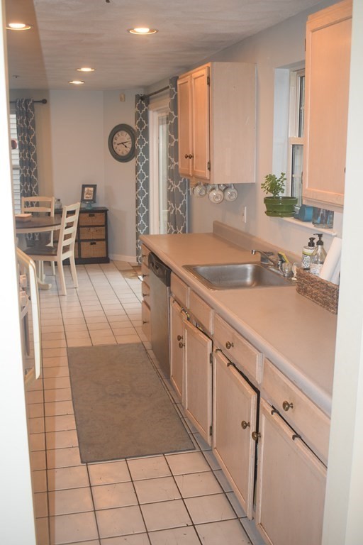 68 Meadowood Road North Andover, MA 01845 - Photo 4 of 40 a kitchen with a sink and cabinets