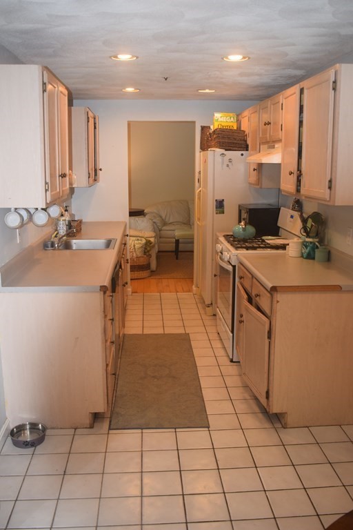 68 Meadowood Road North Andover, MA 01845 - Photo 6 of 40 a kitchen with a sink appliances and cabinets