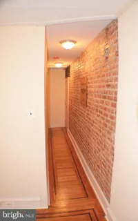 a view of a bathroom with shower