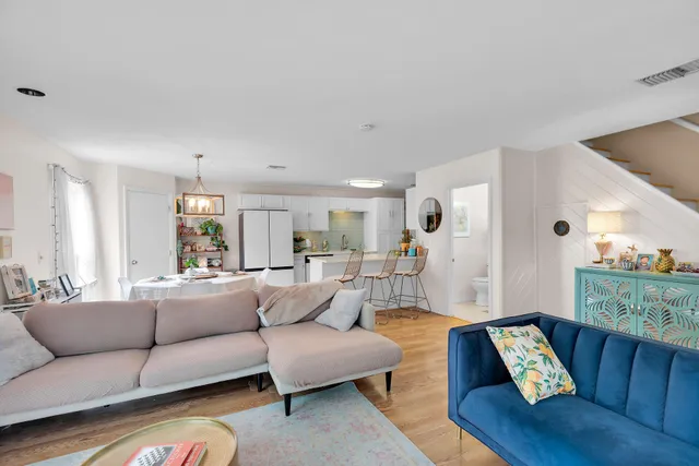 a living room with furniture and a couch