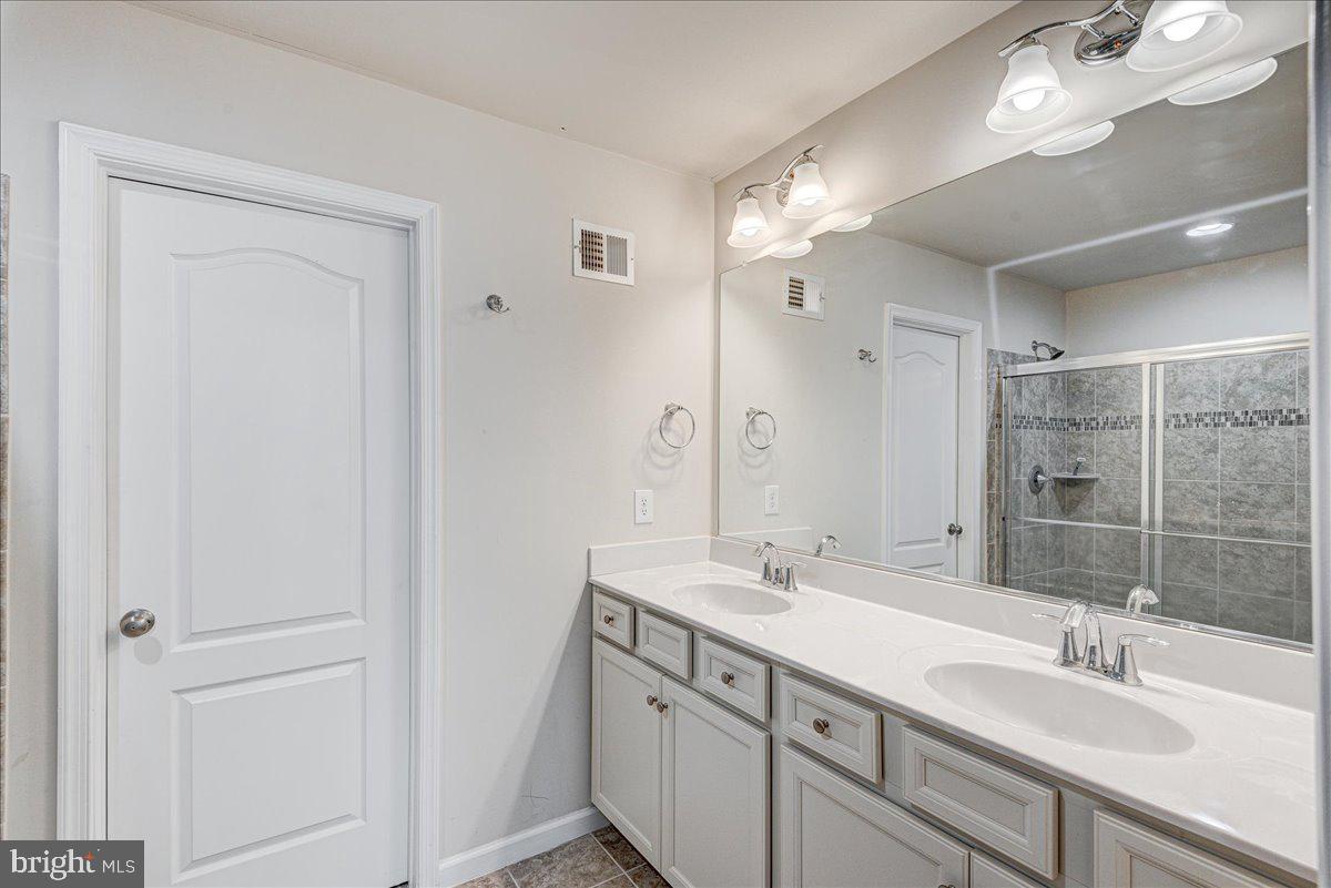 4001 Bradys Hill Road Triangle, VA 22172 - Photo 15 of 29 Large primary bath with sep shower and tub.