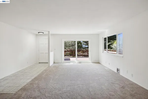 an empty room with windows