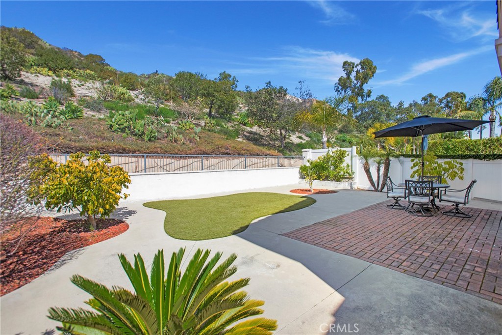 17 Calle Cabrillo Lake Forest, CA 92610 - Photo 18 of 44 a view of a swimming pool with a patio