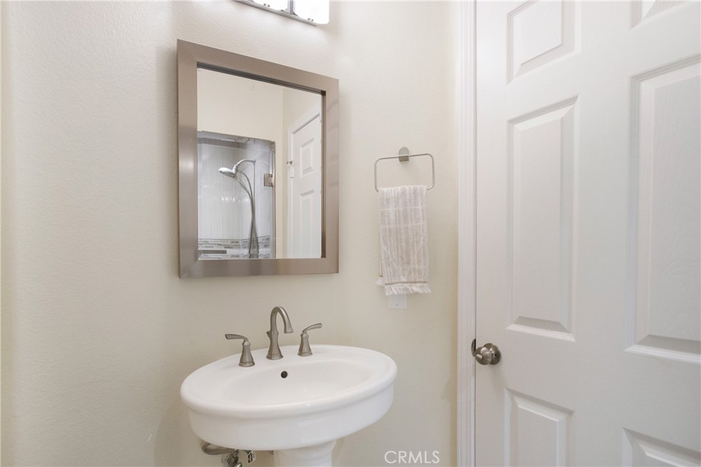 17 Calle Cabrillo Lake Forest, CA 92610 - Photo 20 of 44 a bathroom with a sink and a mirror