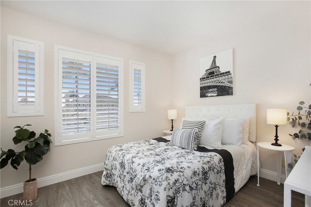 17 Calle Cabrillo Lake Forest, CA 92610 - Photo 24 of 44 a bedroom with a bed and a window