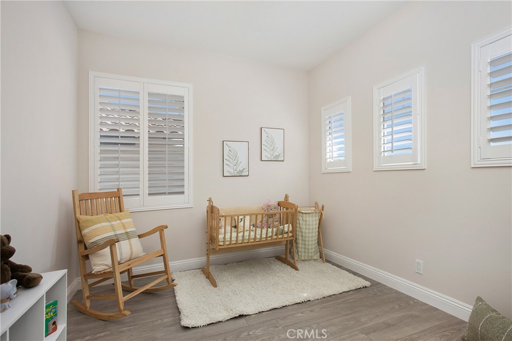 17 Calle Cabrillo Lake Forest, CA 92610 - Photo 25 of 44 a living room with furniture and a window